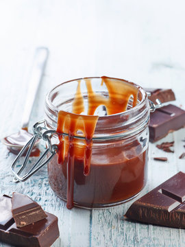 Melted chocolate in a glass jar