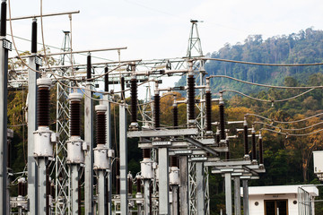 High voltage power pole located on the mountain in Laos.