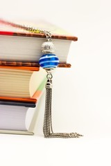 Necklace and books