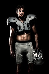 Composite image of shirtless american football player © vectorfusionart