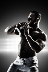 Composite image of shirtless american football player with ball