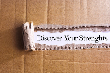 Torn paper box with word Discover your strenghts