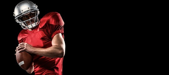 American football player ready to throw ball