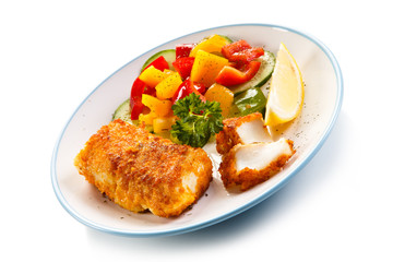 Fish dish - fried fish fillets and vegetables 