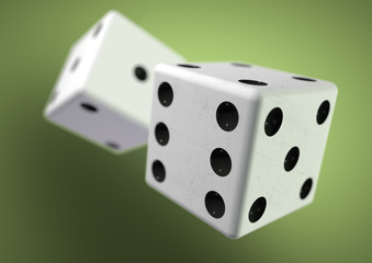 Two die (dice) captured rolling in mid air. Throwing dice in cas