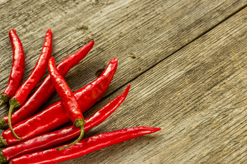 Red Hot Chili Peppers on rustic wooden background