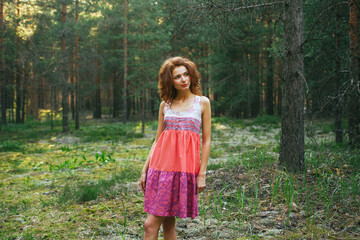 redhead girl in the forest