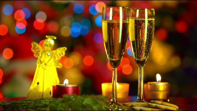 christmas celebration with two champagne glasses 