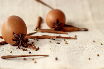 Healthy organic eggs and spice on sackcloth