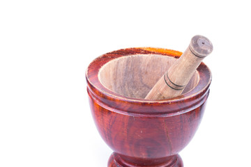 wooden mortar and pestle isolated on white background