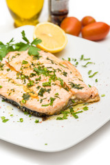 Poached salmon with extra virgin olive oil and parsley 