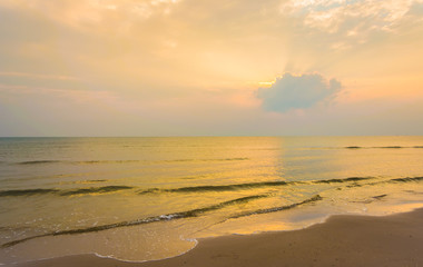 image of sea and cloudy sky over it.