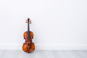 Classical cello on white wall background
