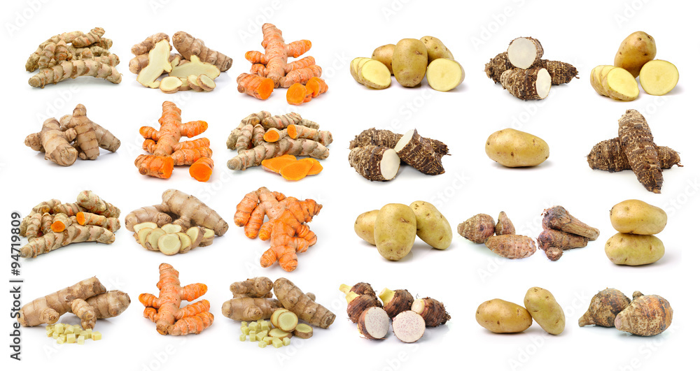 Wall mural turmeric taro root and potato on white background