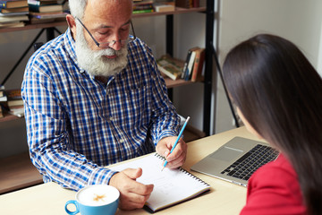 senior man explaining something