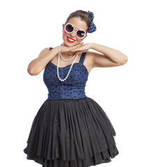 pretty pinup girl posing on a white background
