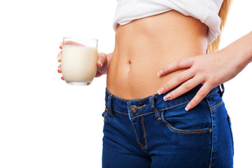 closeup of a pretty girl holding a milk glass