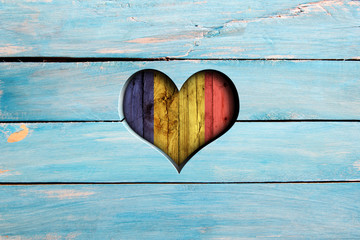 Love Chad. Heart and flag on a blue wooden board