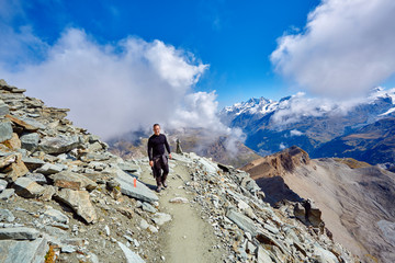 Fototapeta premium hiker at the top of a pass