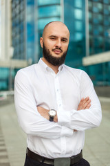 Businessman with beard in white shirt