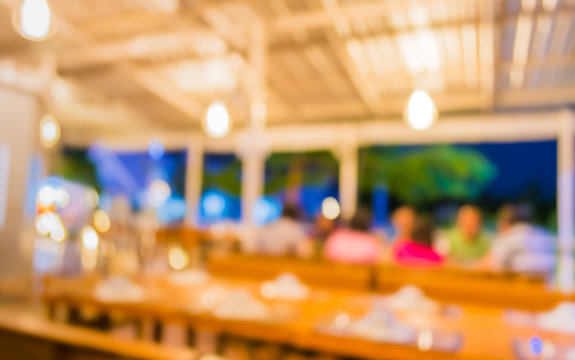 Image Of Blur People At Restaurant On Night Time