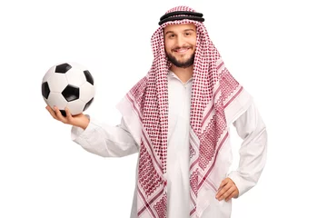 Küchenrückwand glas motiv Young male Arab holding a football © Ljupco Smokovski