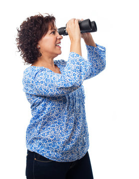 Portrait Of A Mature Woman Looking Through The Binoculars On A White Background