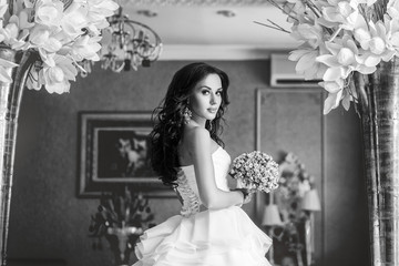 Bride in white wedding dress. Portrait of woman.