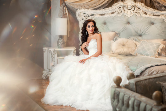 Beautiful woman bride in wedding dress dreaming