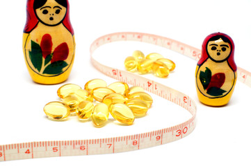 Russian Babushka nesting dolls and Omega 3 capsules