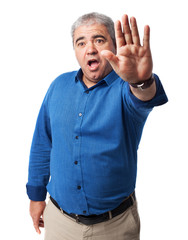 Fototapeta premium man doing stop symbol