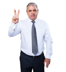 mature man doing number two sign