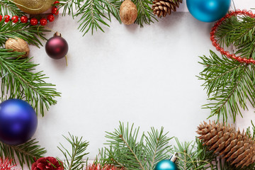 Fototapeta na wymiar Spruce branches with Christmas decorations.