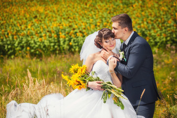 Wedding couple and sunflowers