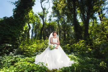 Fototapeta na wymiar Bride in forest