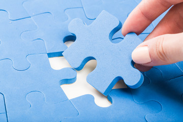business concept for completing the final puzzle piece