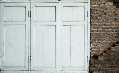 Window and a red brick wall