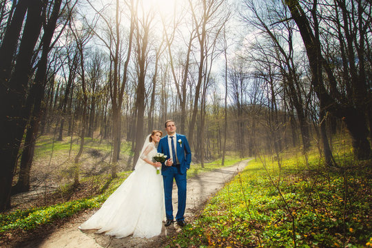 Wedding couple and autumn forest