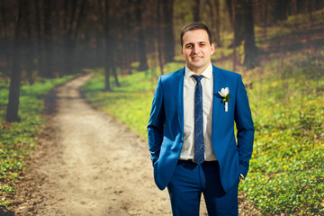 Man groom in forest