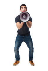 full body young man using a megaphone