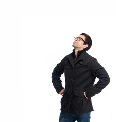 full body young man looking up over white background