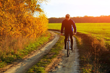 Obraz premium Cyclist Riding the Bike