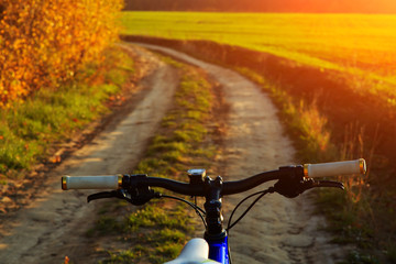 Naklejka na ściany i meble Beautiful close up scene of bicycle at sunset,