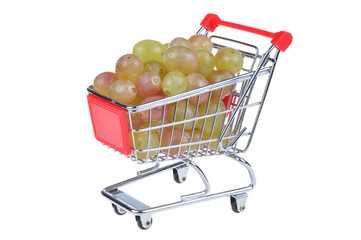 shopping cart with grape isolated on white background