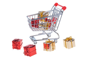 shopping cart with christmas gifts isolated on white background