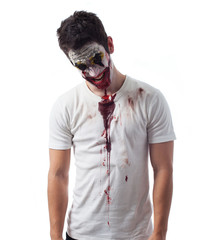 Portrait of an evil clown over white background