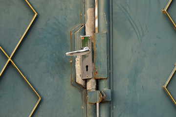 old steel door and silver handle