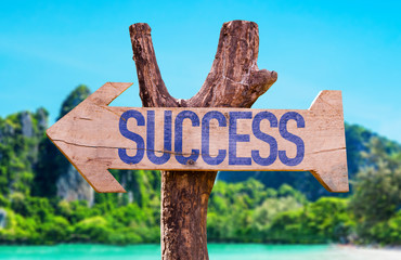 Success arrow with beach background