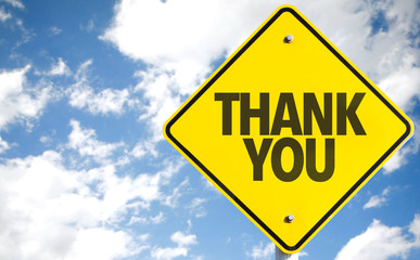 Thank You sign with sky background