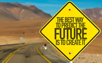 The Best Way To Predict The Future Is To Create It sign on desert road